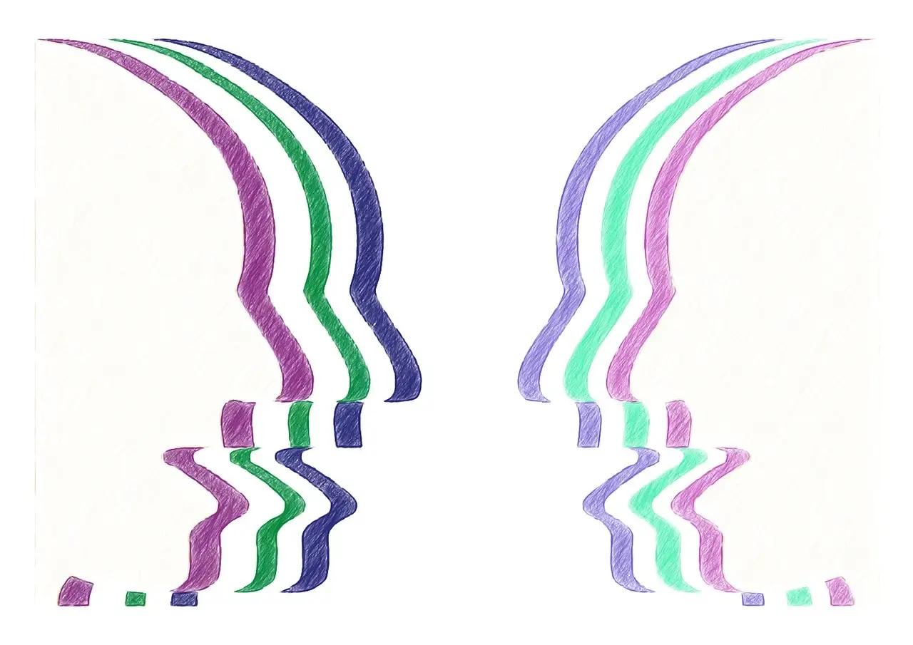 A sketched image of two slightly different coloured faces facing each other